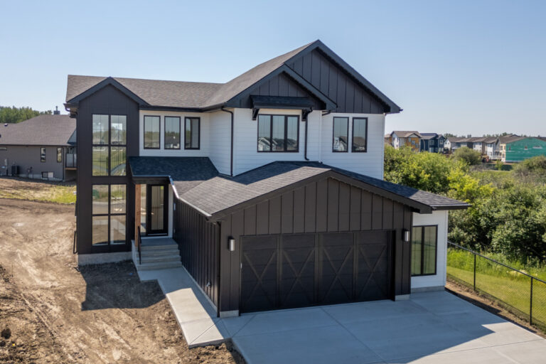 Modern residential home representing the importance of routine exterior maintenance for siding, gutters, and masonry.