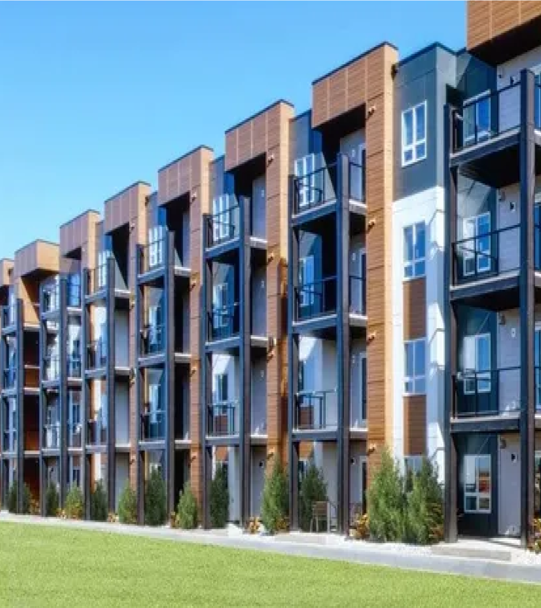 Contemporary multi-family apartment complex with clean exterior lines and modern architectural design.
